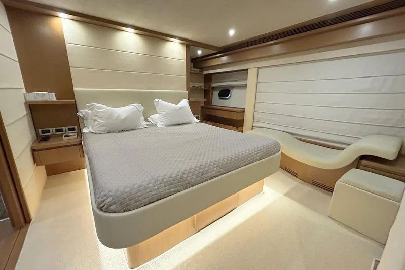 M/y Argo Yacht Photos Pics Luxurious bedroom interior of 2006 Ferretti Yachts 780 with modern design and ambient lighting.