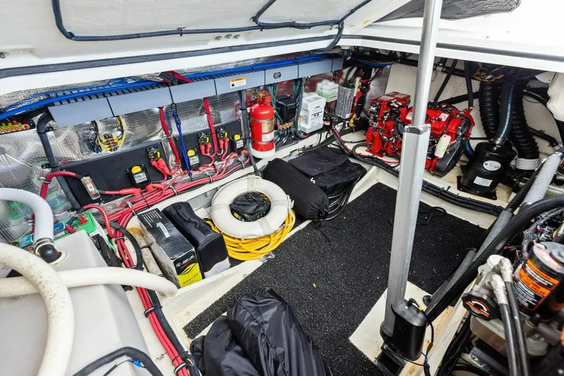 Snuffleupagus Yacht Photos Pics Engine room of 2020 Regal 33 XO boat with wiring and equipment.