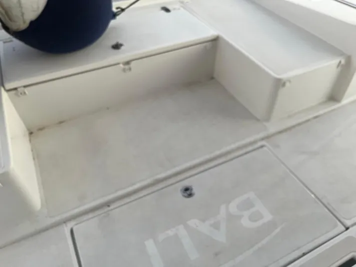  Yacht Photos Pics 2019 Bali 4.3 boat deck with storage compartments and visible branding.