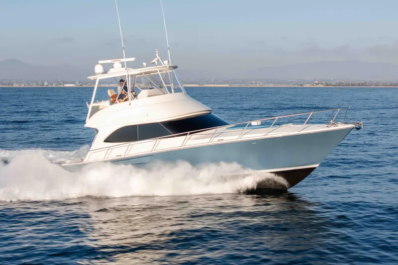 Chaser Yacht Photos Pics 2014 Viking 46 Convertible yacht cruising on open water.