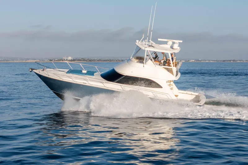 Chaser Yacht Photos Pics 2014 Viking 46 Convertible yacht cruising on open water.