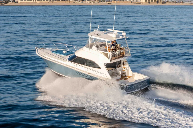 Chaser Yacht Photos Pics 2014 Viking 46 Convertible yacht cruising on open water.