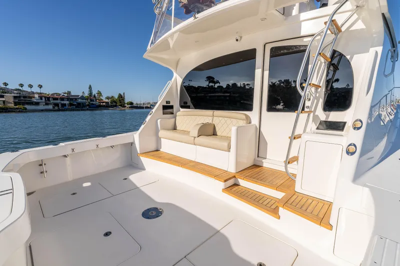 Chaser Yacht Photos Pics Luxurious 2014 Viking 46 Convertible yacht with spacious deck and elegant seating area.