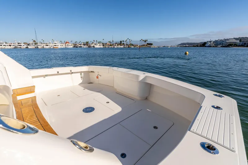 Chaser Yacht Photos Pics Spacious deck of 2014 Viking 46 Convertible yacht on calm water.