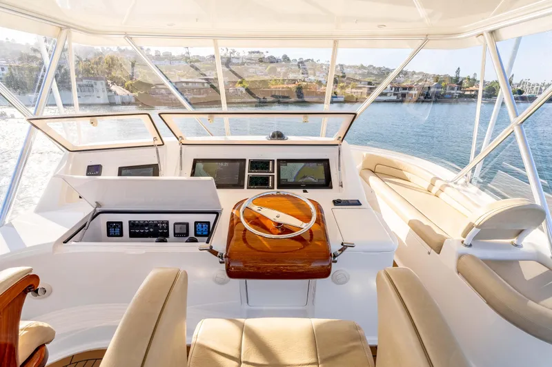 Chaser Yacht Photos Pics 2014 Viking 46 Convertible yacht helm with modern controls and panoramic water view.