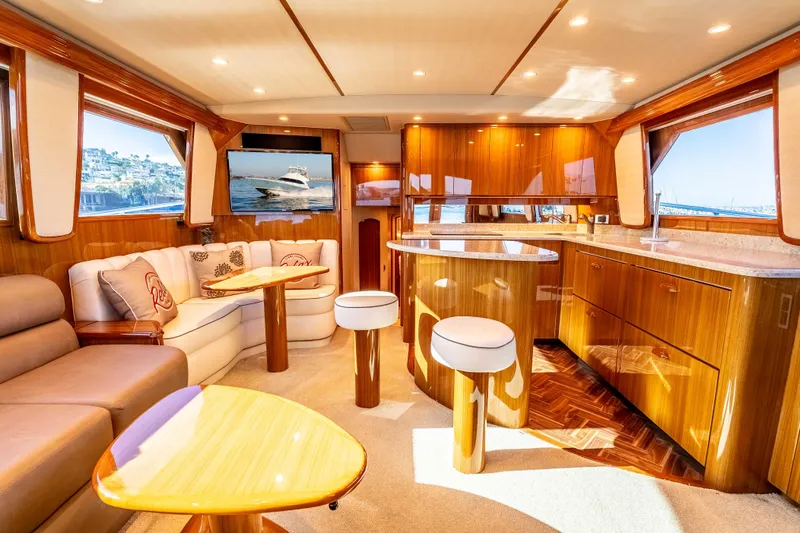 Chaser Yacht Photos Pics Luxurious interior of 2014 Viking 46 Convertible yacht with elegant wood finishes and modern amenities.