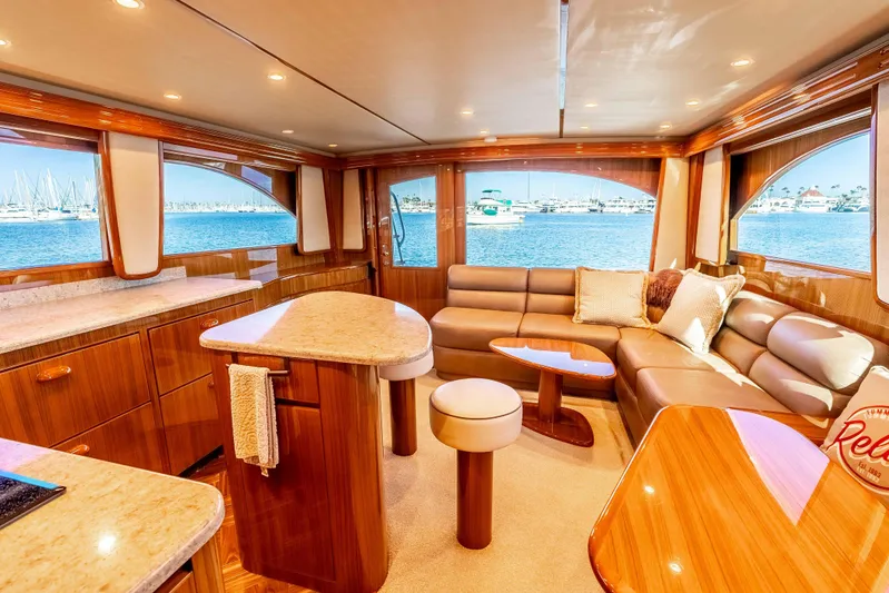 Chaser Yacht Photos Pics Luxurious interior of 2014 Viking 46 Convertible yacht with elegant wood finishes and ocean view.