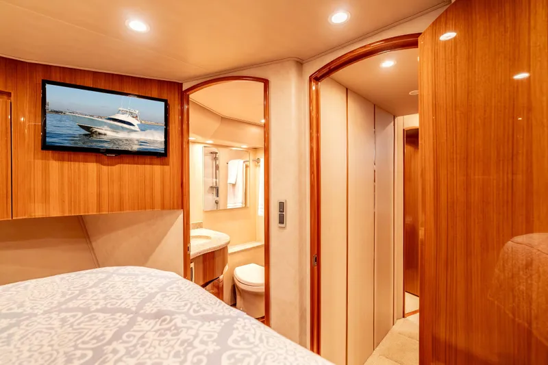 Chaser Yacht Photos Pics Luxurious interior of 2014 Viking 46 Convertible yacht with wood finishes and modern amenities.