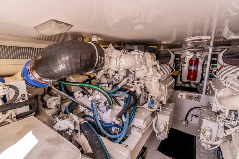 Chaser Yacht Photos Pics Engine room of 2014 Viking 46 Convertible yacht, featuring advanced machinery and equipment.