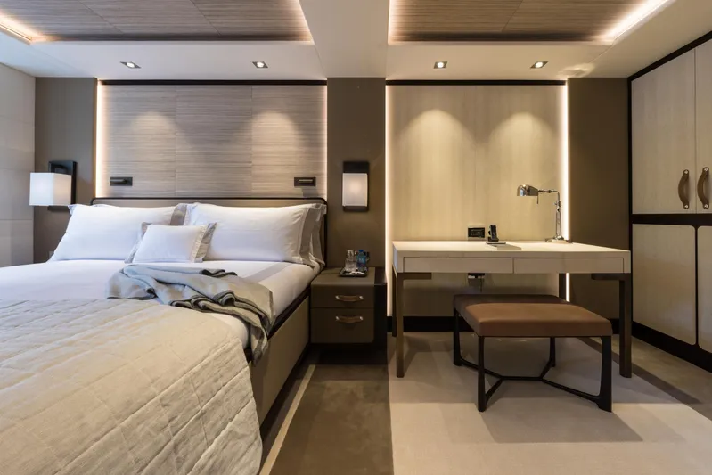 Laurentia Yacht Photos Pics Luxurious bedroom interior on 2017 Heesen Fast Displacement Motor Yacht, featuring modern design elements.