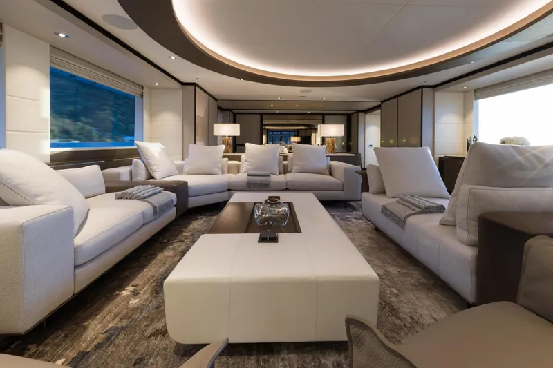 Laurentia Yacht Photos Pics Luxurious interior of 2017 Heesen Fast Displacement Motor Yacht, featuring elegant seating and modern decor.