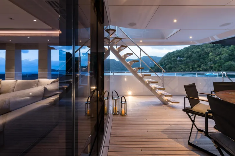 Laurentia Yacht Photos Pics Luxurious 2017 Heesen Fast Displacement Motor Yacht interior with elegant staircase and scenic views.