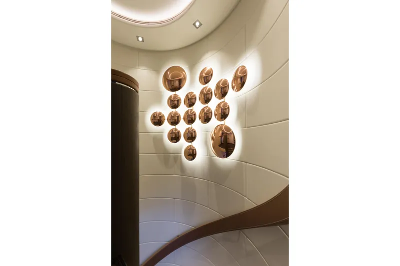 Laurentia Yacht Photos Pics Luxurious interior of 2017 Heesen Fast Displacement Motor Yacht with modern wall decor.