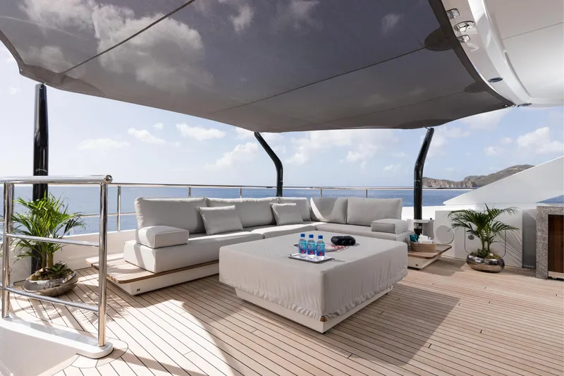 Laurentia Yacht Photos Pics Luxurious deck of 2017 Heesen Fast Displacement Motor Yacht with elegant seating and ocean view.