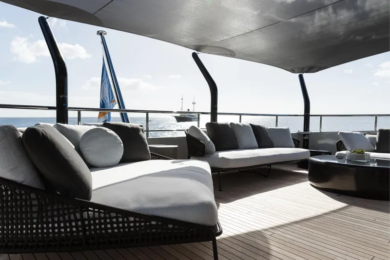 Laurentia Yacht Photos Pics Luxurious 2017 Heesen Fast Displacement Motor Yacht deck with elegant seating and ocean view.