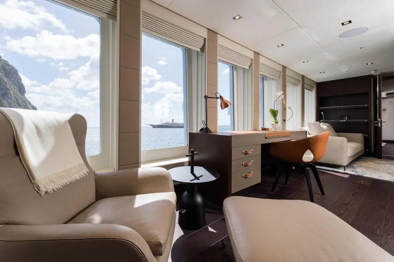 Laurentia Yacht Photos Pics Luxurious interior of 2017 Heesen Fast Displacement Motor Yacht with ocean view and elegant furnishings.