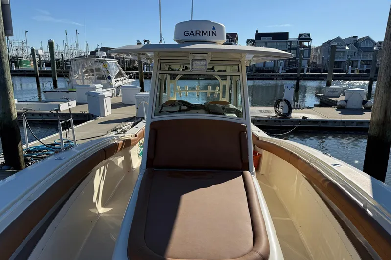 Electric Arc Yacht Photos Pics 2018 Scout 350 LXF boat docked at marina with Garmin equipment.