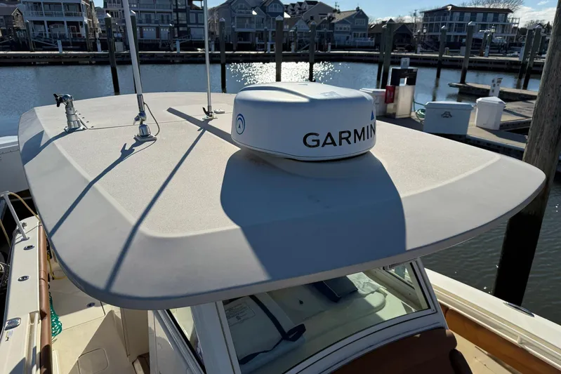 Electric Arc Yacht Photos Pics 2018 Scout 350 LXF boat with Garmin radar at marina dock.