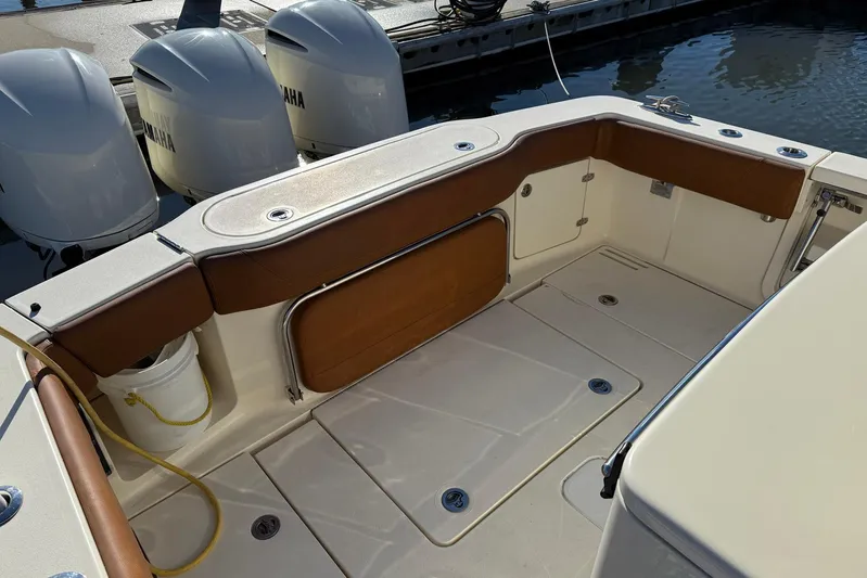 Electric Arc Yacht Photos Pics 2018 Scout 350 LXF boat interior with Yamaha engines, docked at marina.