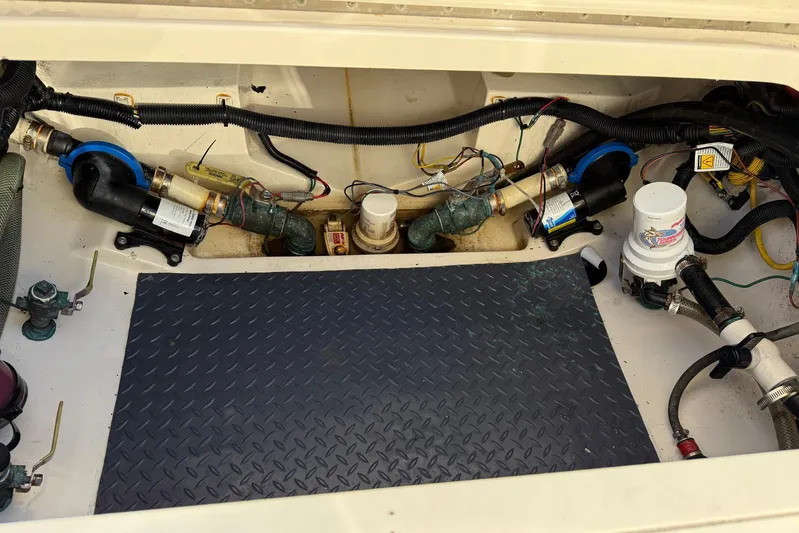 Electric Arc Yacht Photos Pics Engine compartment of a 2018 Scout 350 LXF boat, showing wiring and plumbing components.