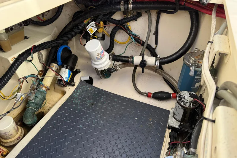 Electric Arc Yacht Photos Pics Engine compartment of a 2018 Scout 350 LXF boat, showing wiring and components.