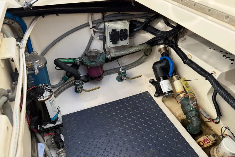 Electric Arc Yacht Photos Pics Engine compartment of a 2018 Scout 350 LXF boat, showcasing various mechanical components.