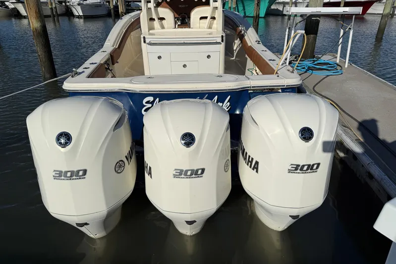 Electric Arc Yacht Photos Pics 2018 Scout 350 LXF boat with triple Yamaha 300 outboard engines docked.