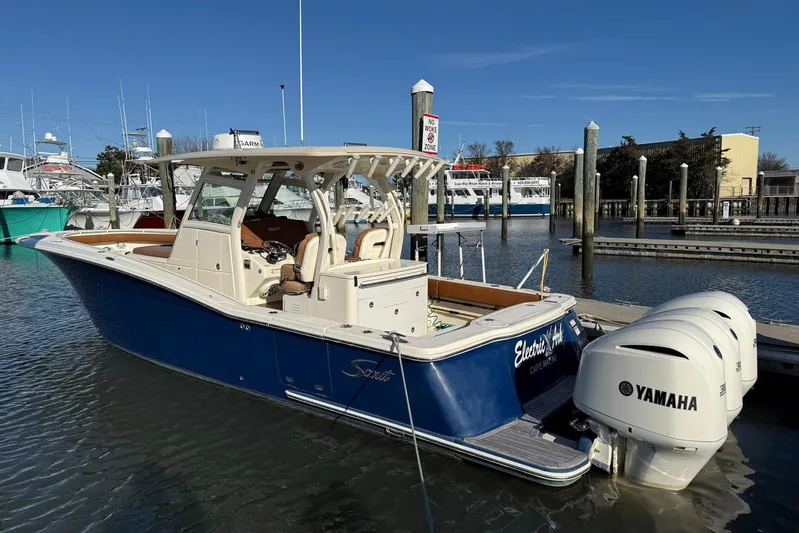 Electric Arc Yacht Photos Pics 2018 Scout 350 LXF boat docked with triple Yamaha engines.