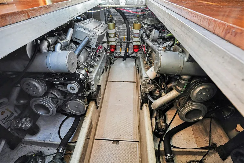 Gypsy Queen Yacht Photos Pics Engine room of a 1991 Shannon VOYAGER boat, showcasing complex machinery.