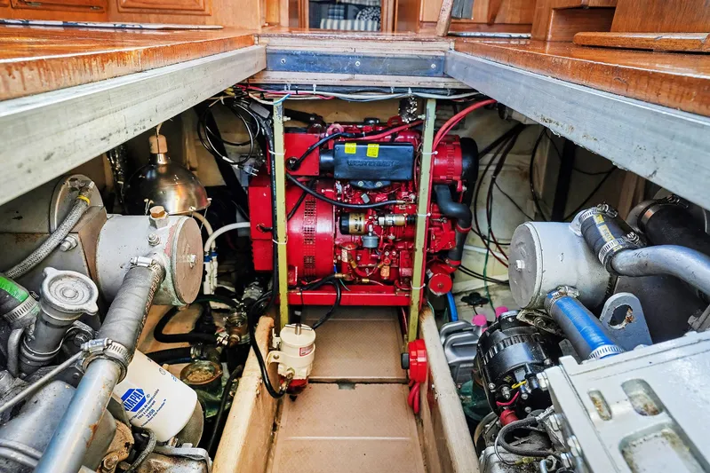 Gypsy Queen Yacht Photos Pics Engine room of a 1991 Shannon VOYAGER boat with red engine.