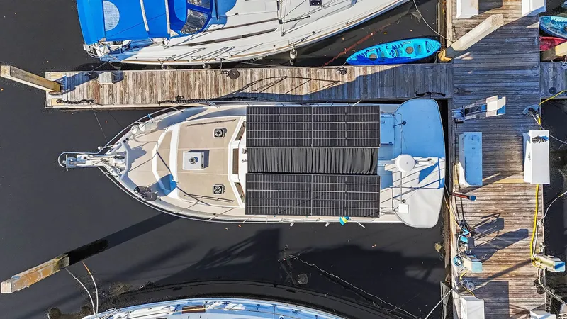 Gypsy Queen Yacht Photos Pics Aerial view of a 1991 Shannon VOYAGER with solar panels at dock.
