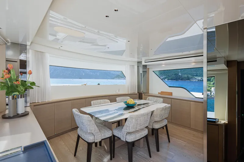 Zafiro III Yacht Photos Pics Luxurious dining area on 2020 Sanlorenzo SX88 yacht with scenic ocean views.