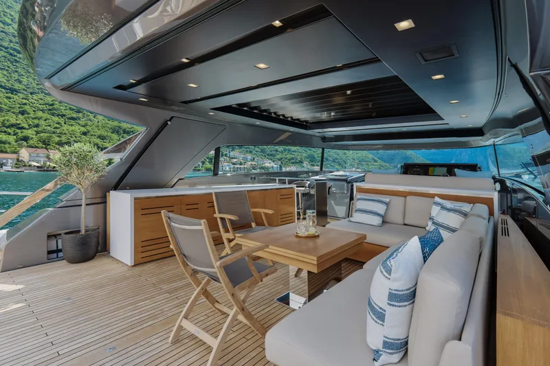 Zafiro III Yacht Photos Pics Luxurious 2020 Sanlorenzo SX88 yacht deck with elegant seating and scenic water view.