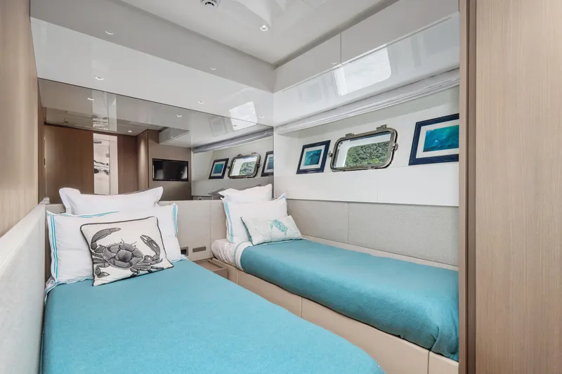 Zafiro III Yacht Photos Pics Luxurious 2020 Sanlorenzo SX88 yacht cabin with twin beds and modern decor.