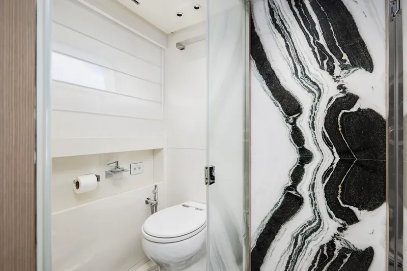 Zafiro III Yacht Photos Pics Luxurious bathroom in 2020 Sanlorenzo SX88 yacht with elegant marble wall design.