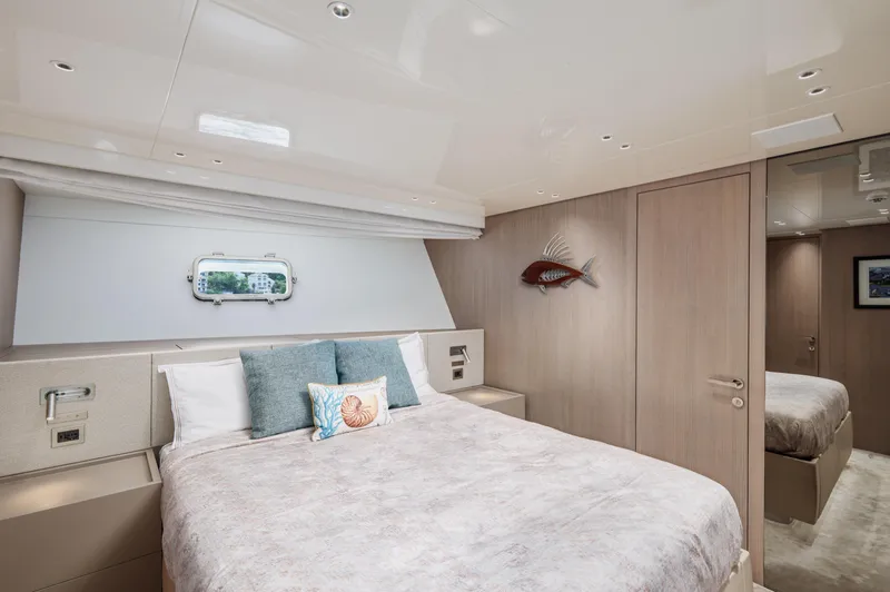 Zafiro III Yacht Photos Pics Luxurious bedroom interior of 2020 Sanlorenzo SX88 yacht with modern decor and cozy bedding.