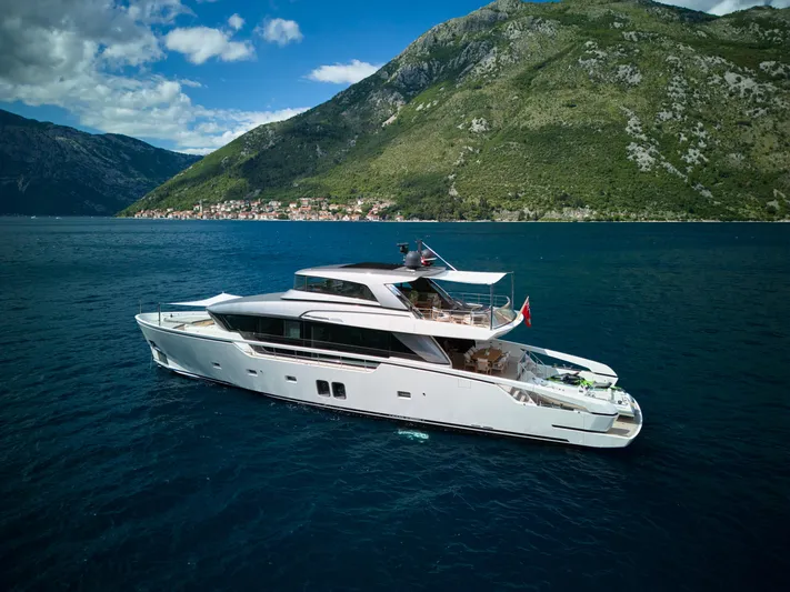 Zafiro III Yacht Photos Pics Luxurious 2020 Sanlorenzo SX88 yacht cruising in scenic coastal waters.