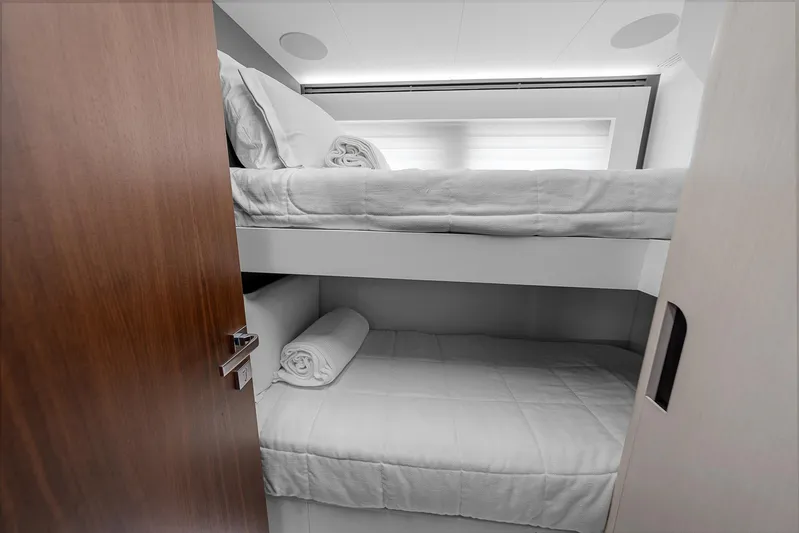 Ascendo Yacht Photos Pics Astondoa 66 yacht 2022 interior with cozy bunk beds and modern design.