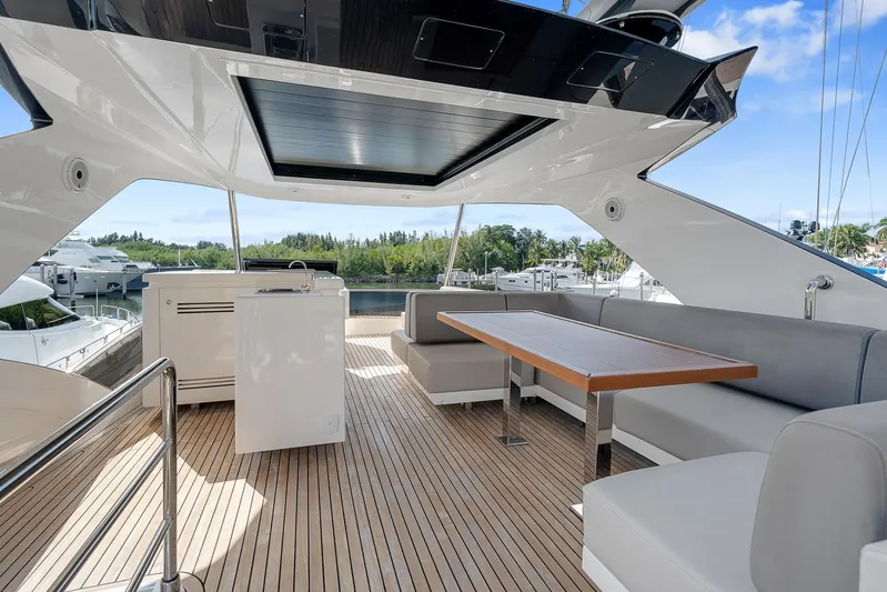 Ascendo Yacht Photos Pics Luxurious 2022 Astondoa 66 yacht deck with modern seating and sleek design.