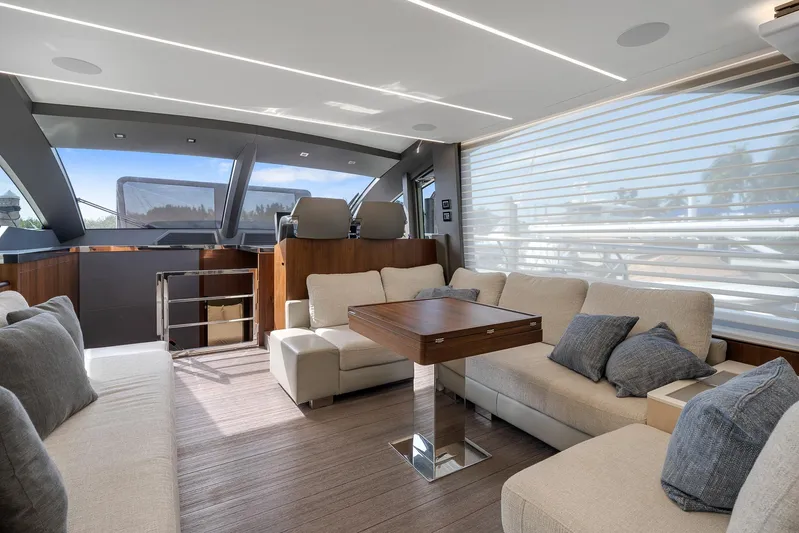 Ascendo Yacht Photos Pics Luxurious interior of 2022 Astondoa 66 yacht with modern seating and sleek design.