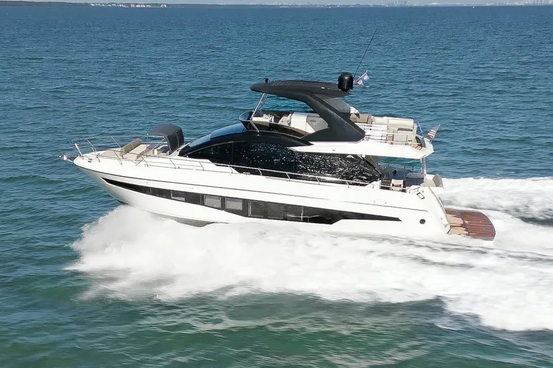 Ascendo Yacht Photos Pics 2022 Astondoa 66 yacht cruising on open water.