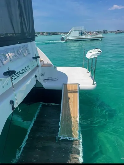 Hideout Yacht Photos Pics Luxury Horizon PC65 yacht in turquoise waters, Pensacola, Florida, 2022 model.