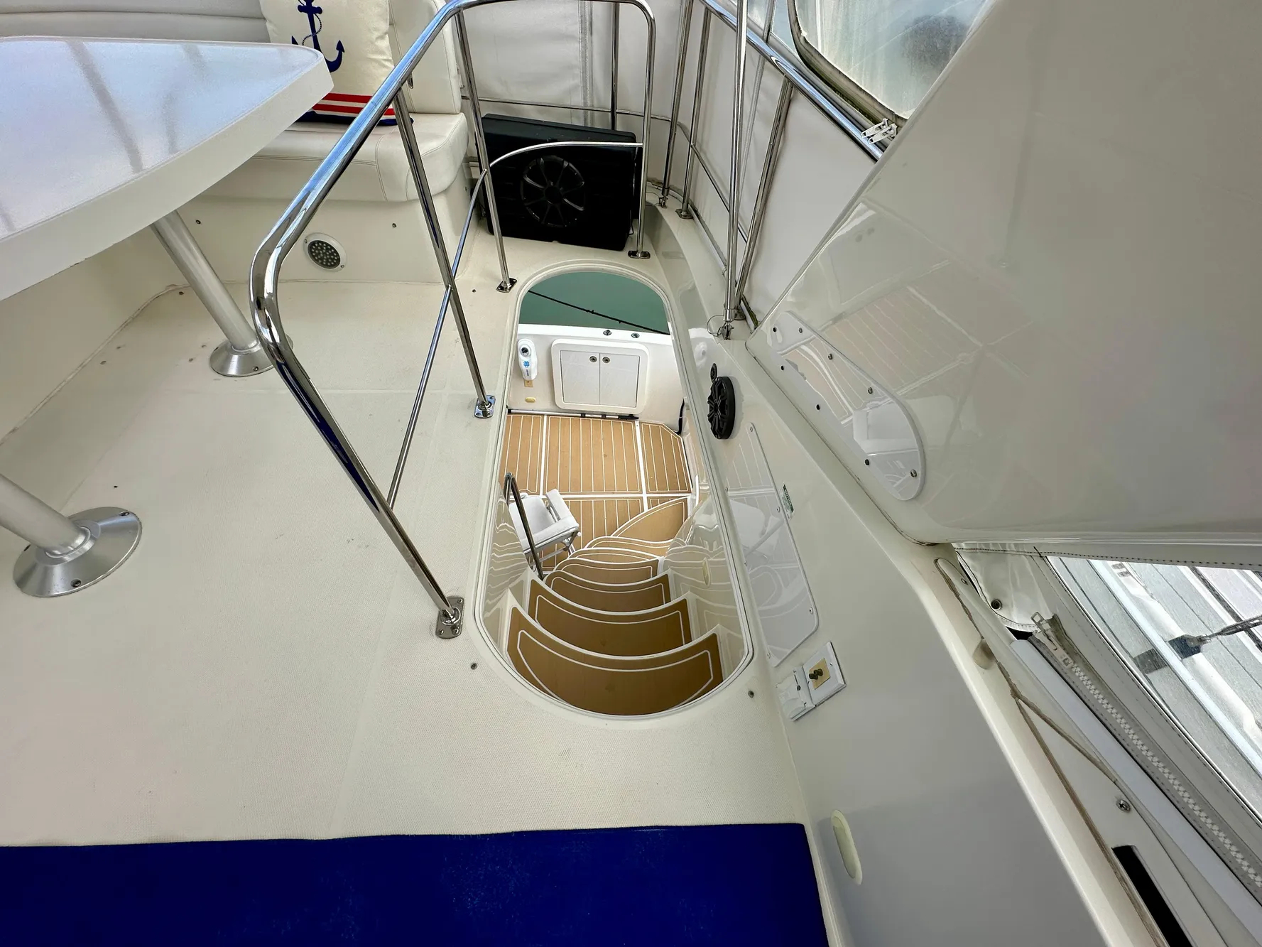 2008 Carver 43 Super Sport yacht interior with staircase and seating area.