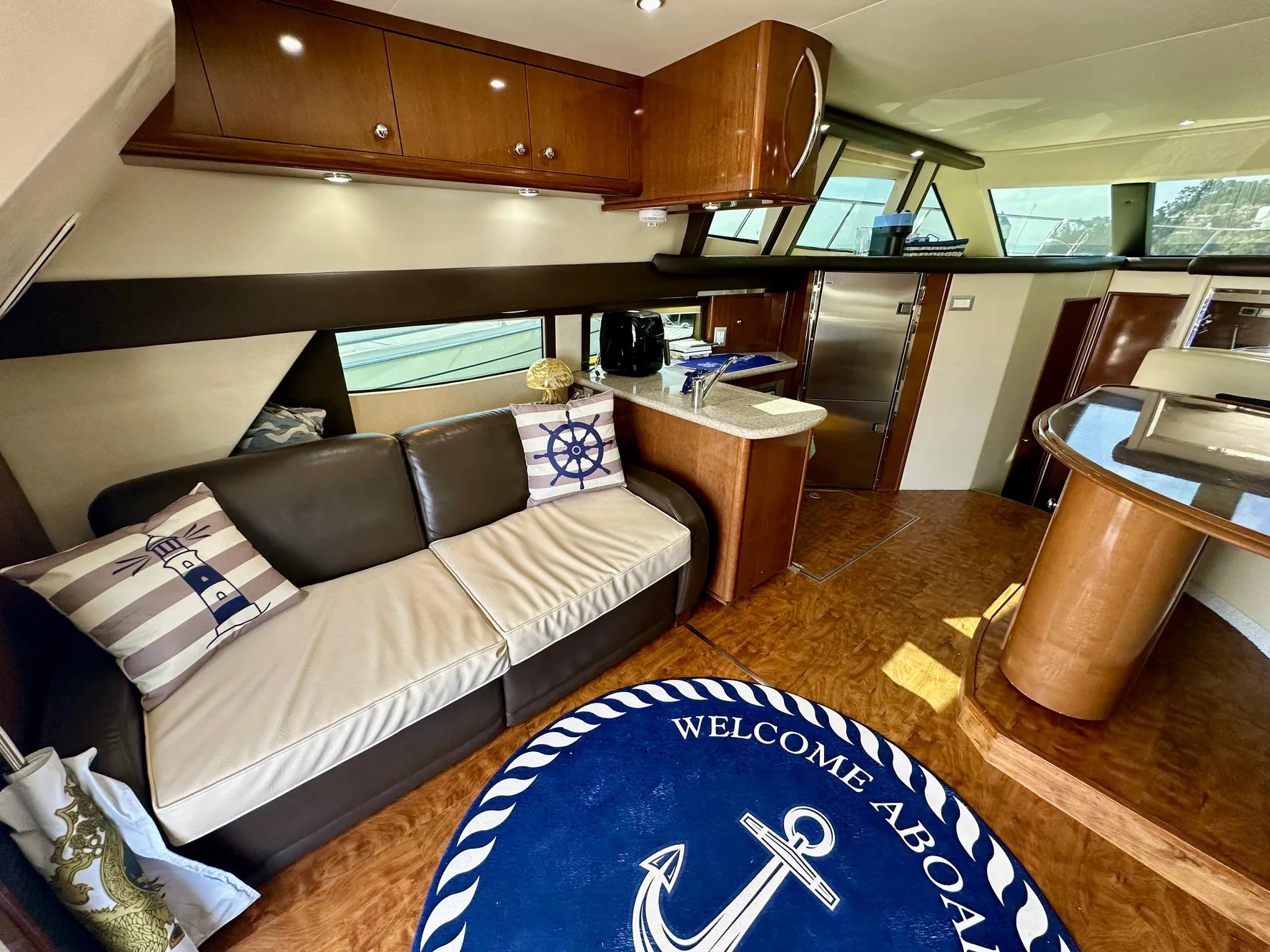 Interior of 2008 Carver 43 Super Sport yacht with modern furnishings and nautical decor.