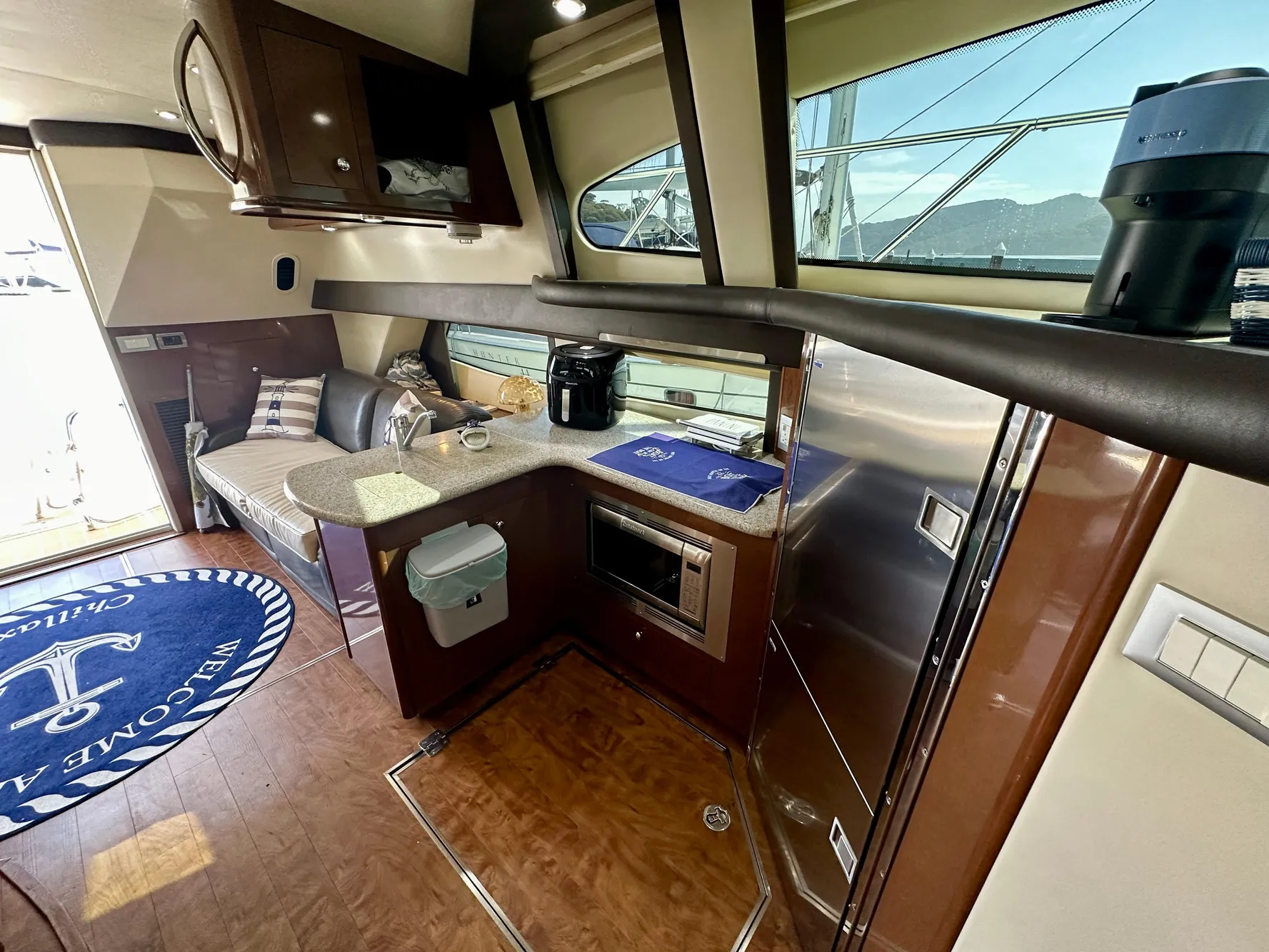Interior of 2008 Carver 43 Super Sport yacht with modern kitchen and seating area.