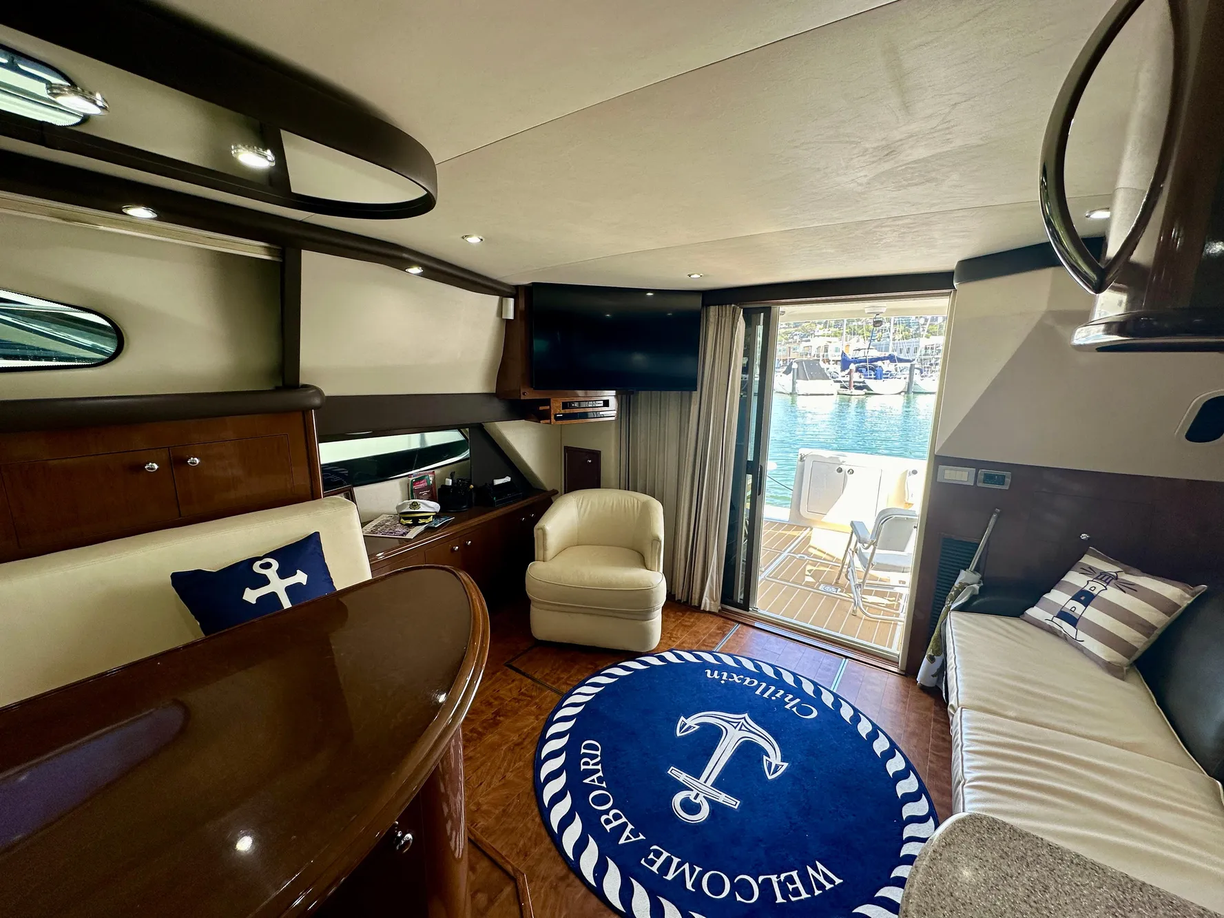 Luxurious interior of 2008 Carver 43 Super Sport yacht with nautical decor.