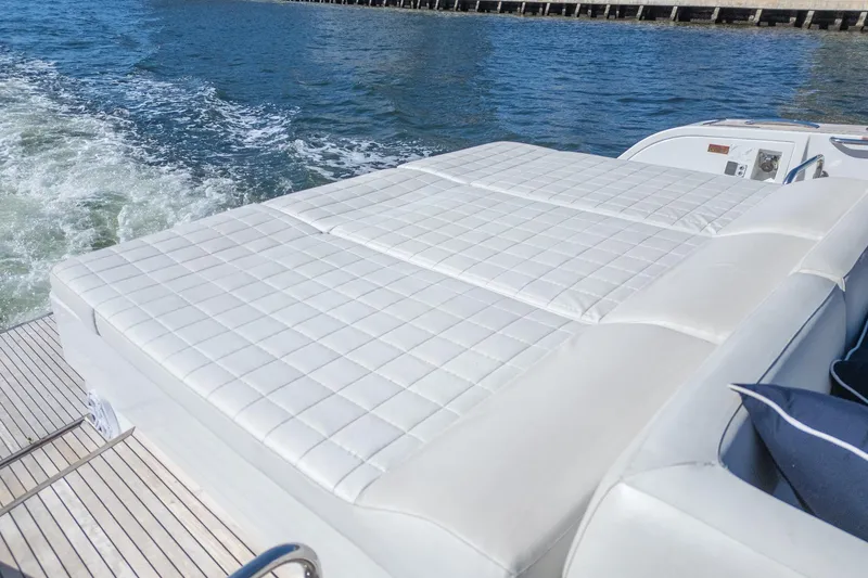  Yacht Photos Pics Luxurious sunbed on 2019 Pardo Yachts P50, cruising on serene waters.