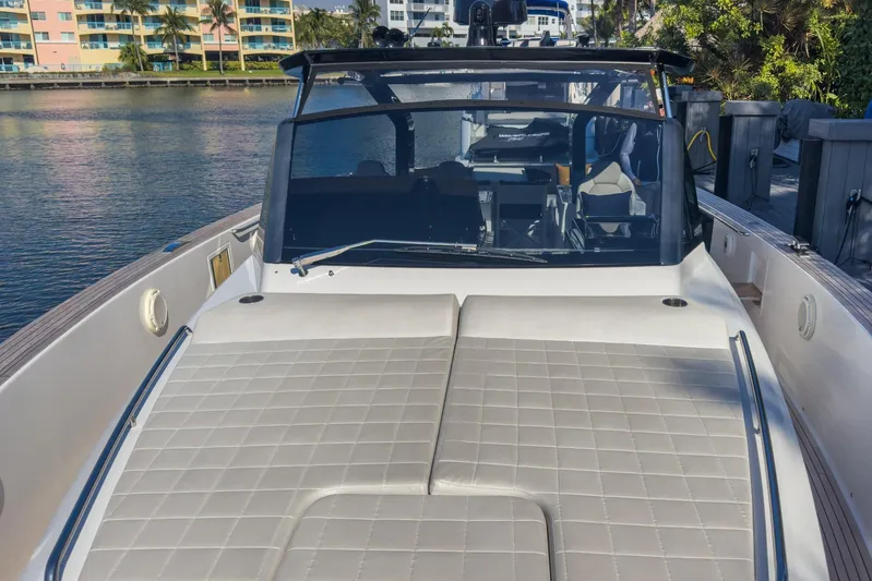  Yacht Photos Pics 2019 Pardo Yachts P50 luxury yacht docked by waterfront buildings.