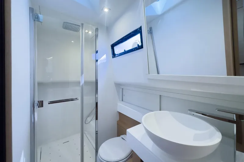  Yacht Photos Pics Modern bathroom interior on 2019 Pardo Yachts P50, featuring sleek shower and basin.