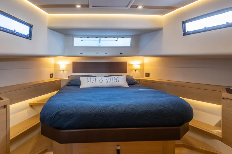  Yacht Photos Pics Luxurious cabin interior of 2019 Pardo Yachts P50 with cozy bed and ambient lighting.